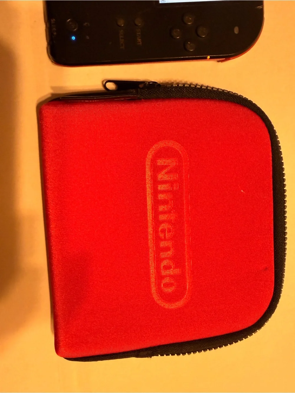 Nintendo Black 2DS XL with Red Nintendo Zip Case